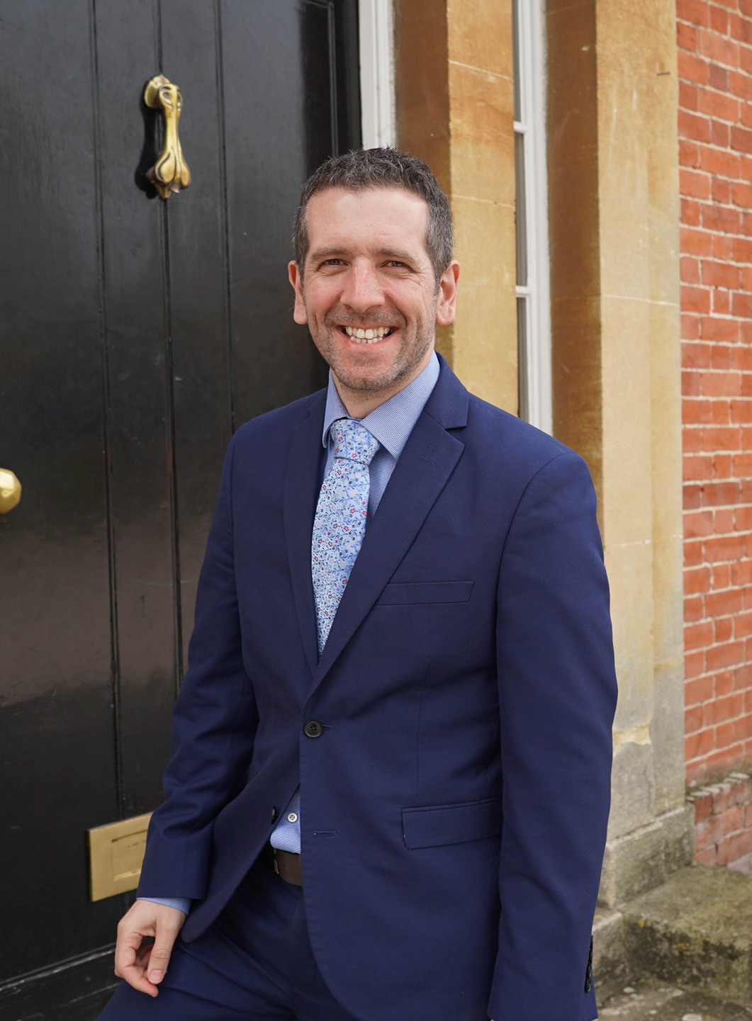 Headmaster, Dr J Raymond